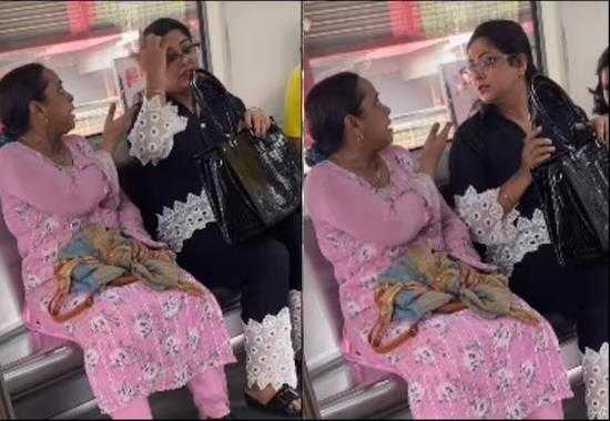 Woman-pushes-girl-in-train Ugly-spat-on-Delhi-Metro Delhi-Metro-viral-image